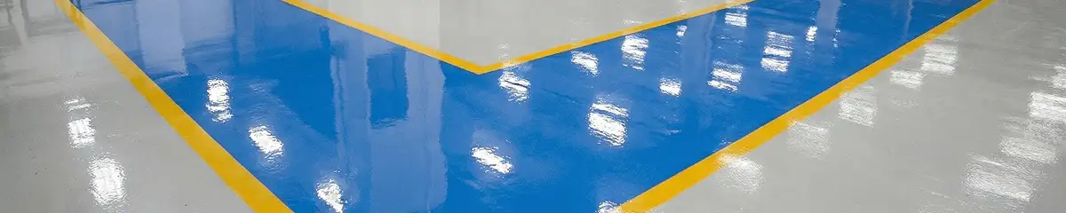 A factory floor professionally covered and marked with epoxy flooring in Charleston, SC