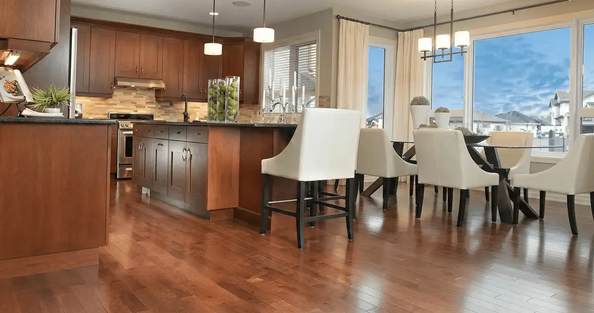 A modern kitchen with professionally installed wood flooring in Charleston, SC