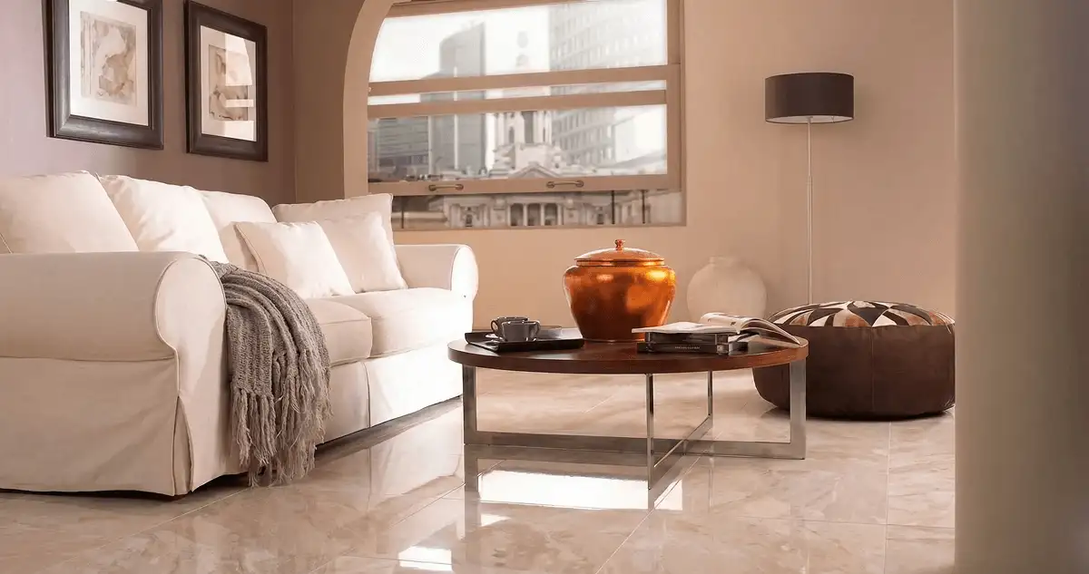 Modern living room with professionally installed marble flooring, a beige sofa, coffee table in Charleston, SC