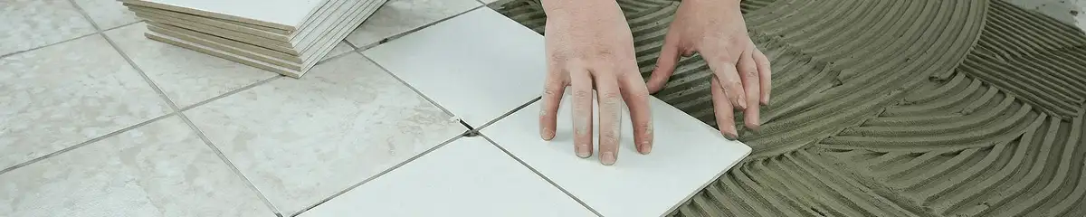 Professional installing white tile floors in Charleston, SC