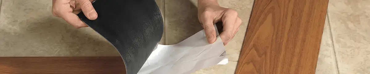 A professional installing vinyl flooring in Charleston, SC